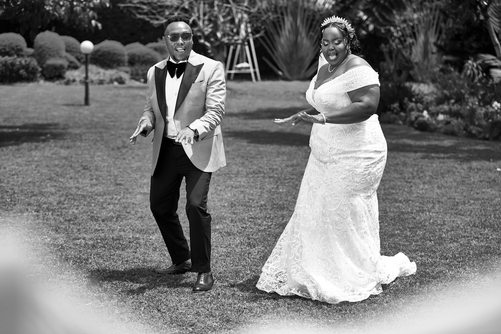 A man and a woman standing in a field