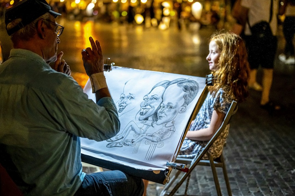 unsplash_B_LweMG6UiY_caricature artist sketching